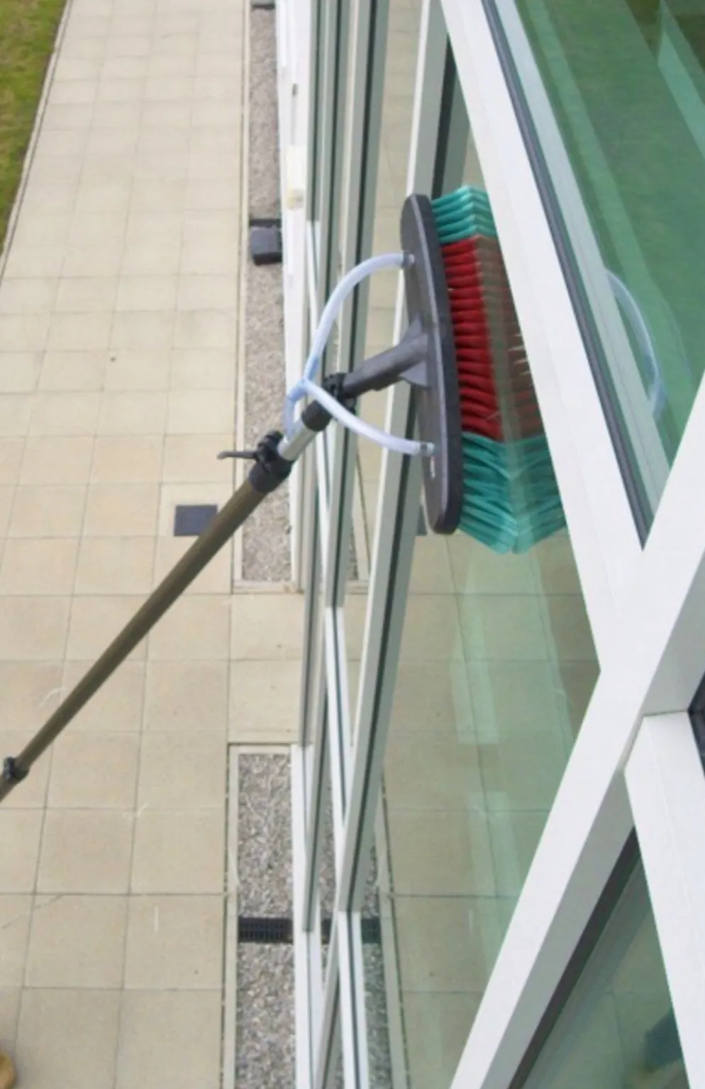 Close-up of brush cleaning glass