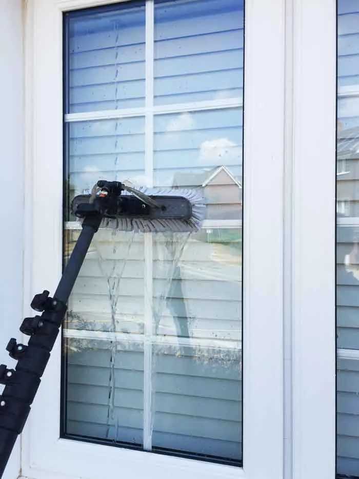 Pure water window cleaning with brush